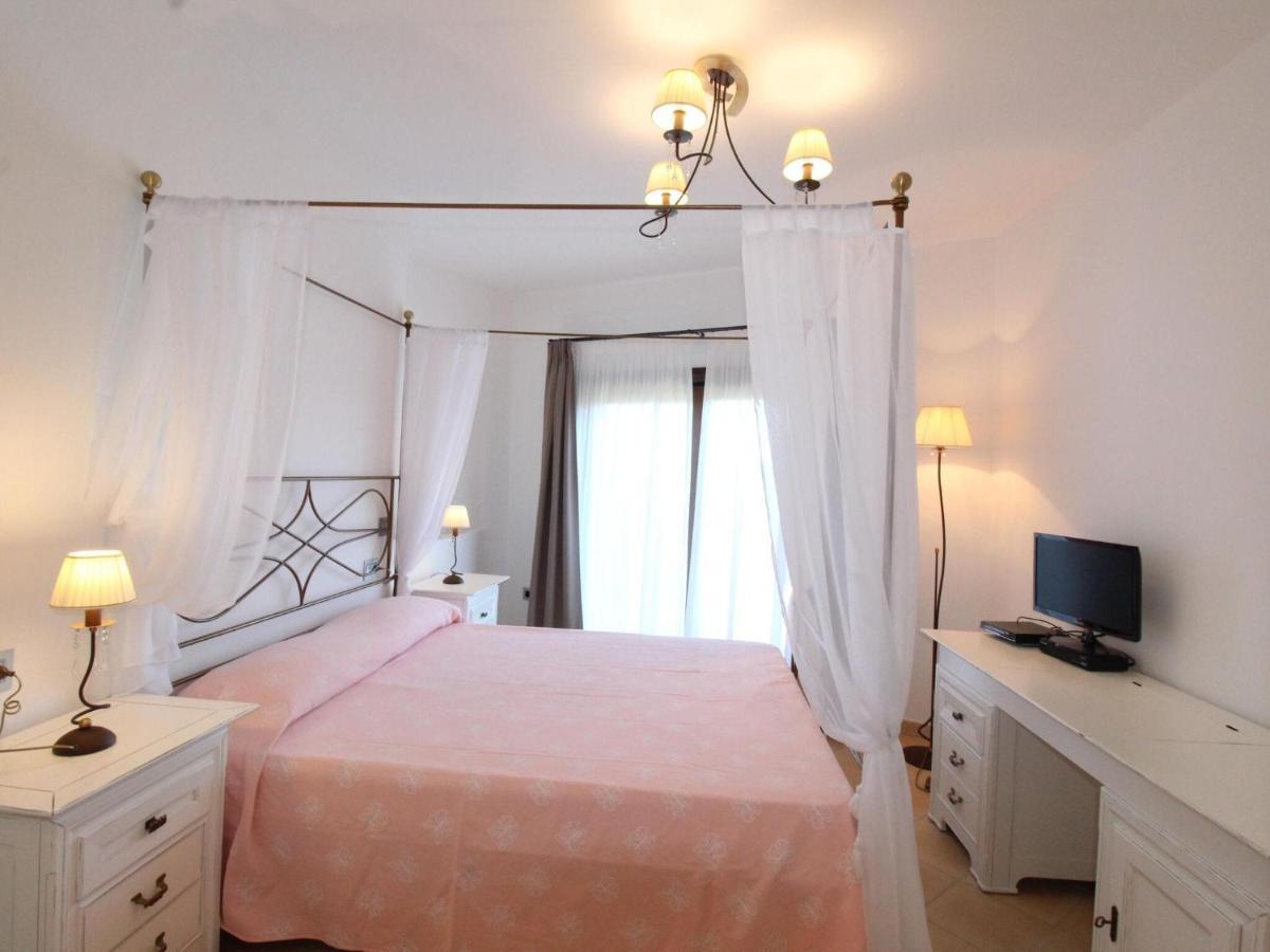 Holiday House, La Conia Cannigione Apartment ภายนอก รูปภาพ