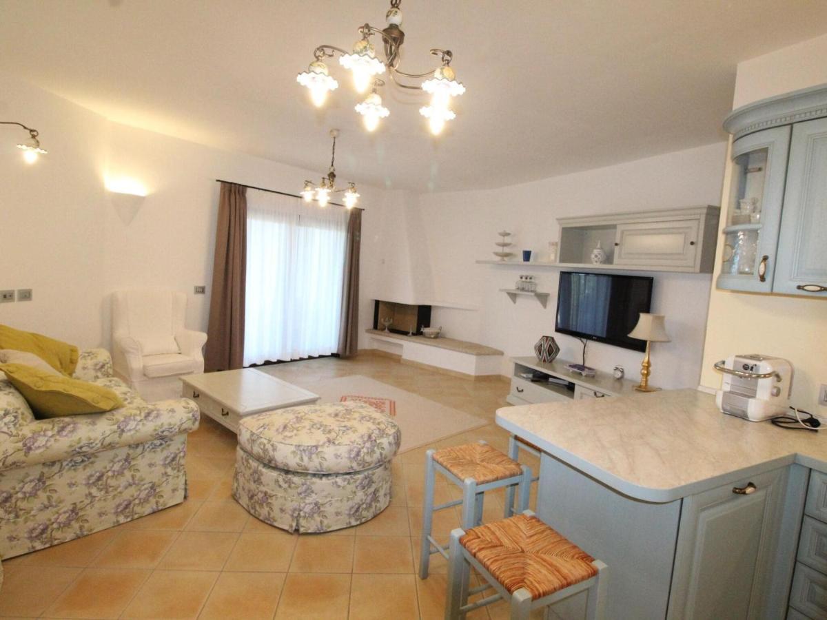 Holiday House, La Conia Cannigione Apartment ภายนอก รูปภาพ